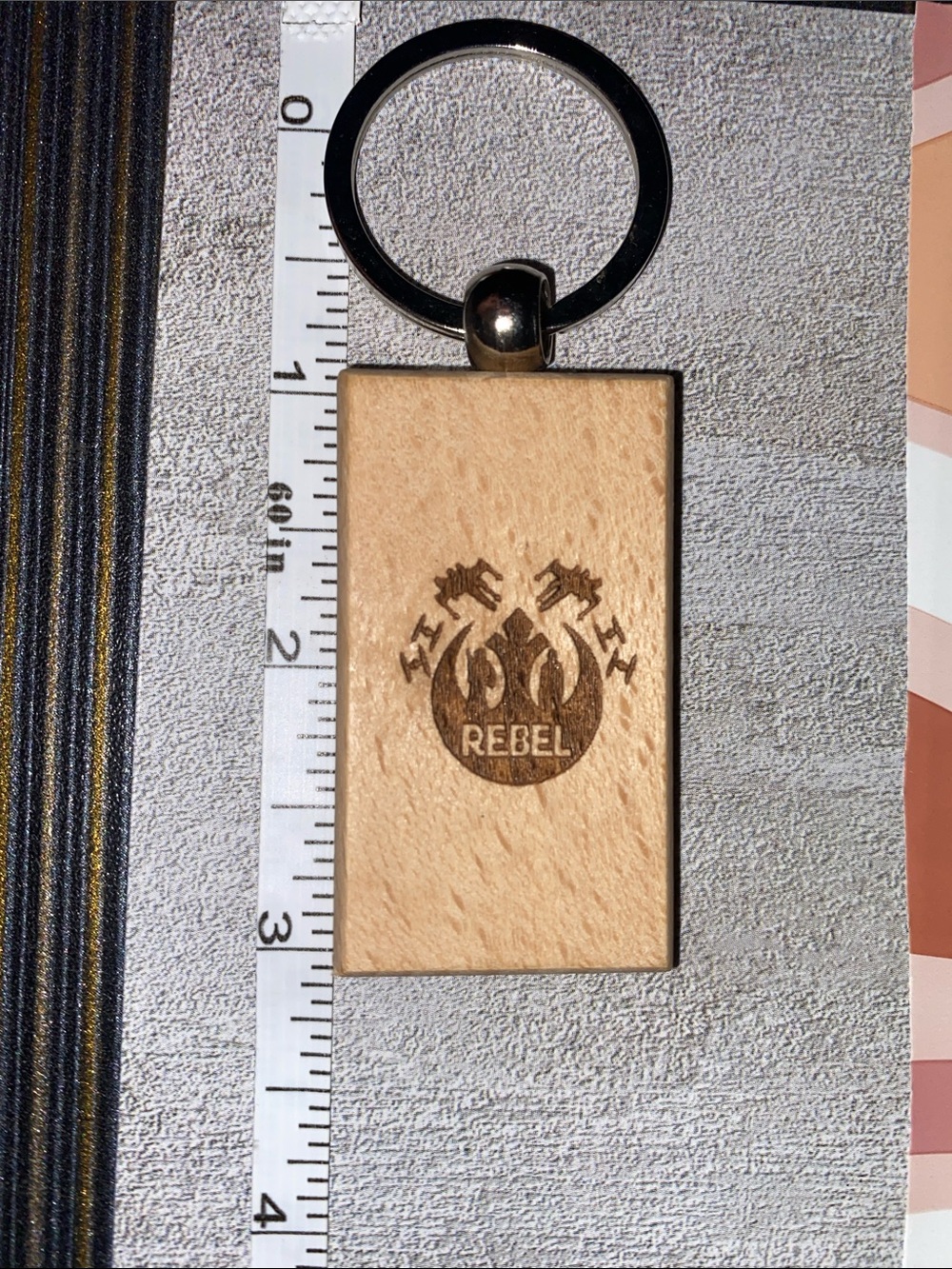This laser engraved image is from Star Wars inspired keychain rectangular wood.